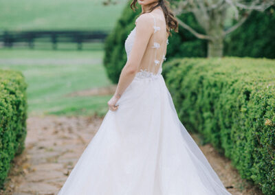 Gallery Image of bride on stone path